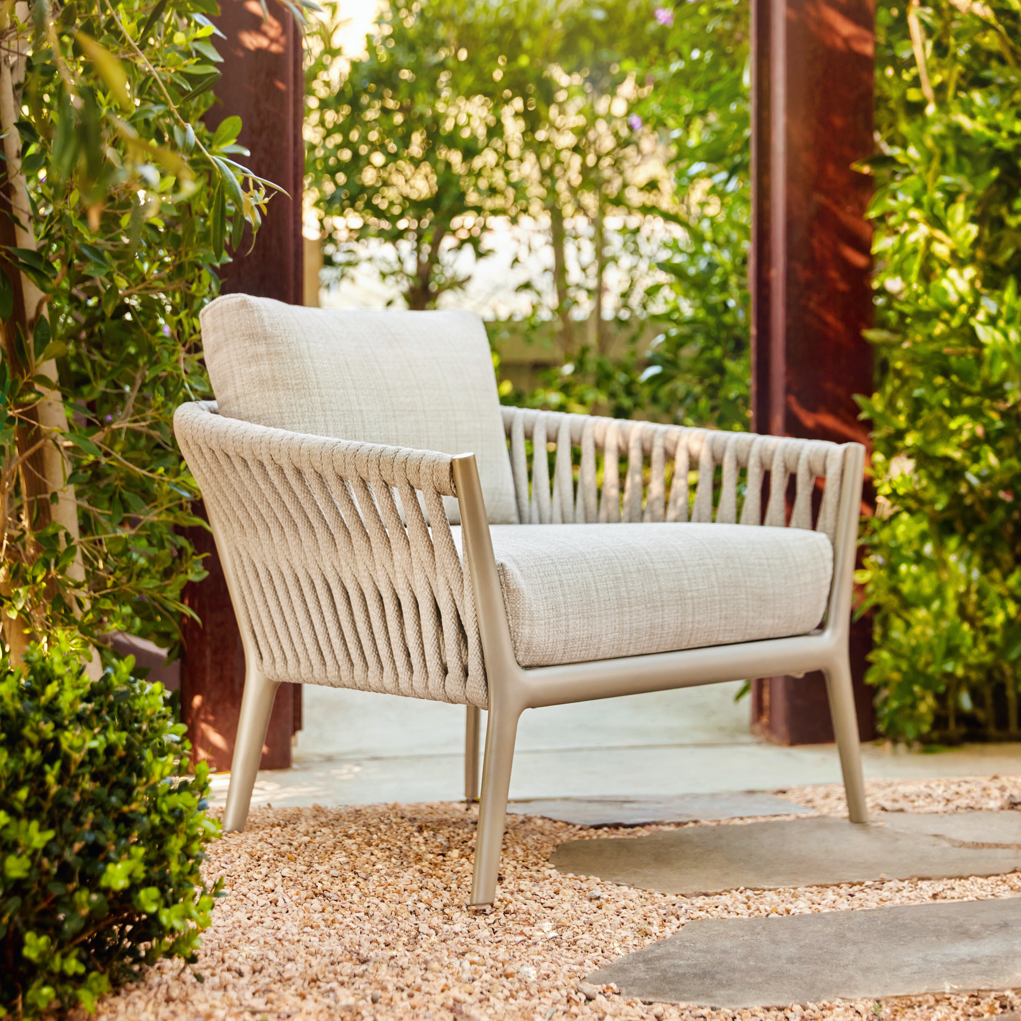 Luxury outdoor lounge chairs and ottomans
