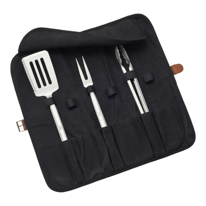 Black fabric grill tool roll with four stainless steel utensils, including spatula and fork