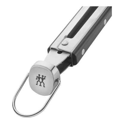 Grill tongs with hanging loop and round silver latch on dark handle back